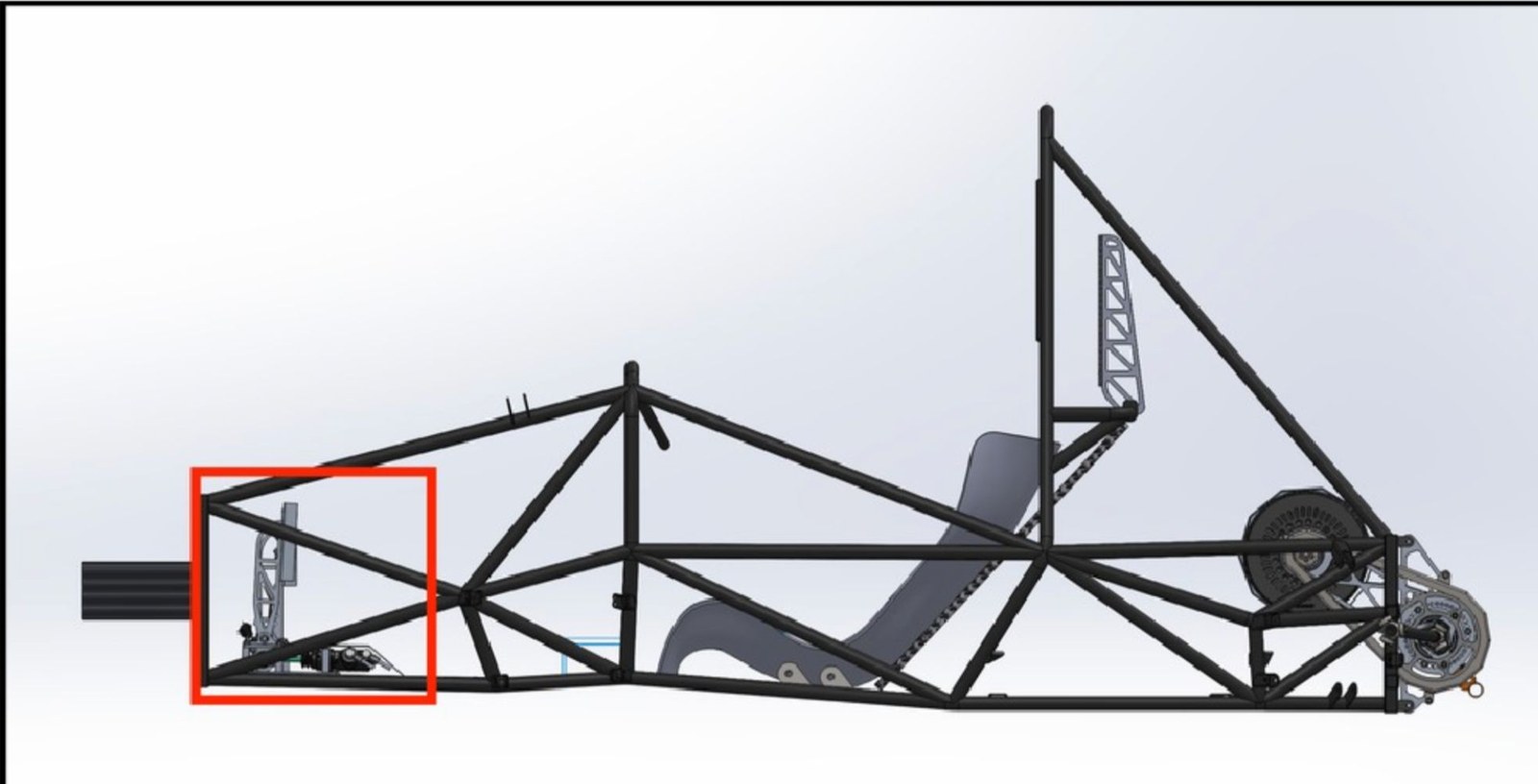 Side view of the chassis frame with the pedal box area outlined in red